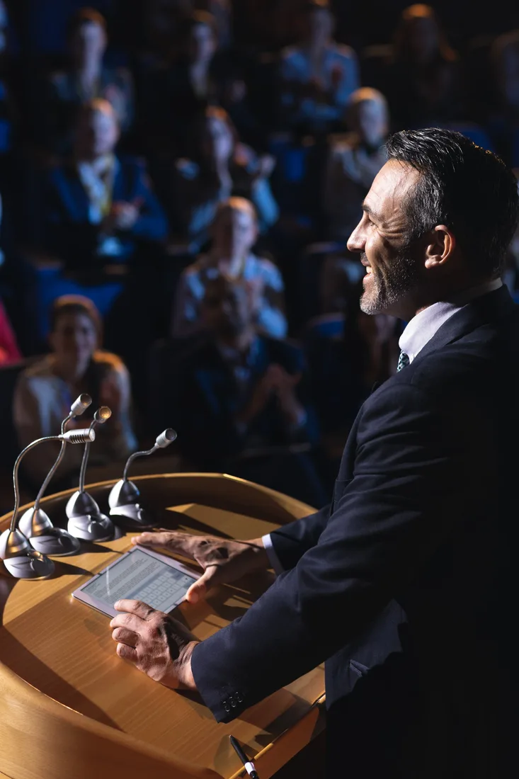 Presenter speaking at an in-person event